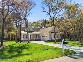 1943 Redfish SW, Supply, NC 28462 — 4-bedroom home in Oyster Harbour, Supply, NC, photo 2 of 42: Front Exterior