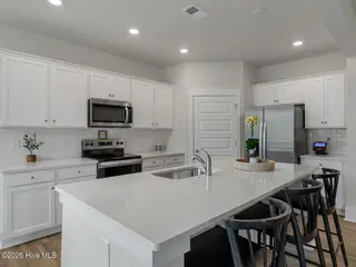 9454 Crowded Gules Drive Lot 217, Leland, NC 28451 – photo 10: TulipPolplar21303kitDRHL33A487-009-042-1