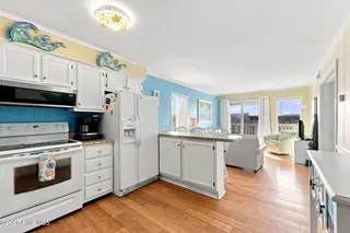 1904 E Fort Macon Road 301, Atlantic Beach, NC 28512 – photo 2: 26-web-or-mls-APATB-#301---028_with_tv_e