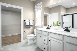 1303 Piper Glen Drive, Sunset Beach, NC 28468 – photo 7: Primary Bath