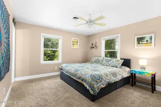 133 Doe Drive, Emerald Isle, NC 28594 – photo 5: Primary suite overlooking backyard