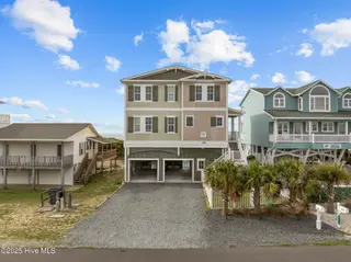 911 Ocean Boulevard W, Holden Beach, NC 28462 – photo 1: 1-web-or-mls-DJI_20250407065337_0932_D