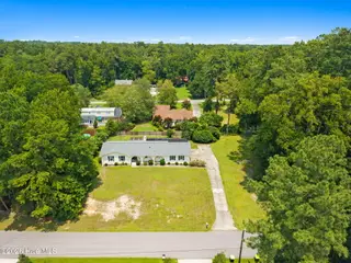 423 S Edgewood Circle, Whiteville, NC 28472 – photo 3: front above 1