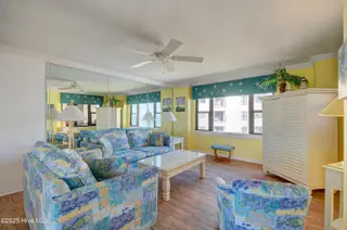 1505 Salter Path Road 435, Indian Beach, NC 28512 – photo 13: Living Room with Mirror Wall