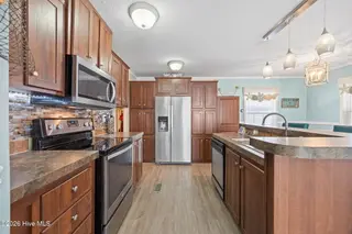 217 NE 75th Street, Oak Island, NC 28465 – photo 19: 23-web-or-mls-IMG_5243 - Copy - Copy