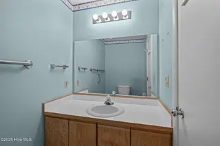 304 Lord Granville Drive, Morehead City, NC 28557 – photo 17: Downstairs half bath