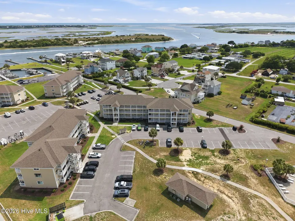 650 Cedar Point Boulevard C21, Cedar Point, NC 28584 – photo 1 of 30: 15-web-or-mls-DJI_20260715152556_0205_D