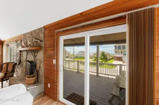413 Club Colony Drive, Atlantic Beach, NC 28512 – photo 7: Living room with ocean views