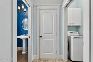 1225 Searay Lane, Carolina Beach, NC 28428 – photo 17: Pantry, Laundry Room, 1/2 bath