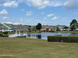 601 Sloop Pointe Lane, Kure Beach, NC 28449 – photo 4: Pond Scene 2