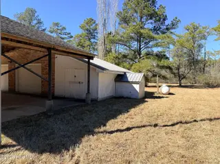 19 Wilkins Road, Belhaven, NC 27810 – photo 12: 12 View of car port and side of garage