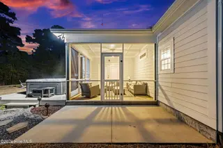 307 Lightning Bug Lane, Holly Ridge, NC 28445 – photo 24: 24-web-or-mls-Screened-in Porch
