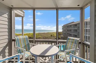 2111 W Ft Macon Road 248 Dunescape, Atlantic Beach, NC 28512 – photo 17: Screened porch off of living room