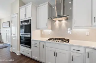 6475 Bryson Drive SW, Ocean Isle Beach, NC 28469 – photo 12: Prestige kitchen- double wall oven