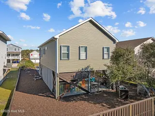 1903 E Pelican Drive, Oak Island, NC 28465 – photo 9: 12-web-or-mls-DJI_20251111083031_0632_D