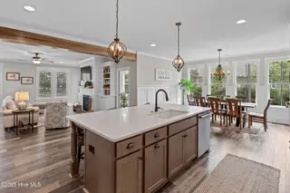 3997 Wyndmere Drive, Southport, NC 28461 – photo 12: Coastal Chic Two-Toned Kitchen Cabinetry