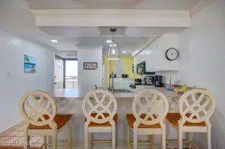 1505 Salter Path Road 435, Indian Beach, NC 28512 – photo 10: View from LR into Kitchen/Foyer