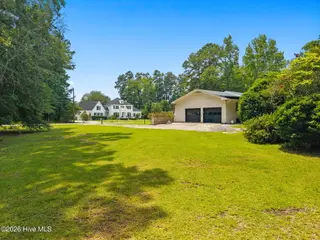 423 S Edgewood Circle, Whiteville, NC 28472 – photo 5: garage doors
