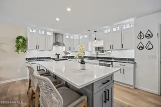 111 NW 10th Street, Oak Island, NC 28465 – photo 14: 25 kitchen