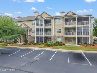221 Woodlands Way Unit 21, Calabash, NC 28467 — 2-bedroom condo in Crow Creek, Calabash, NC, photo 3 of 39: Parking Lot View