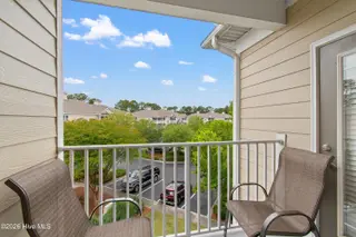 221 Woodlands Way Unit 21, Calabash, NC 28467 — 2-bedroom condo in Crow Creek, Calabash, NC, photo 18 of 39: Primary Balcony