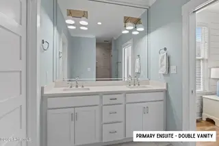 1607 W Fort Macon Road, Atlantic Beach, NC 28512 – photo 11: Primary Ensuite with Double Vanity