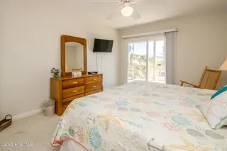1131 S Shore Drive, Surf City, NC 28445 – photo 19: Streetside South King Bedroom II