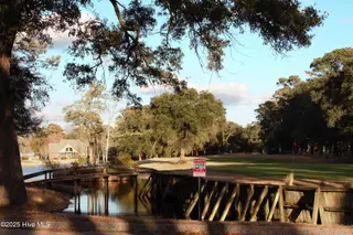 2031 Greenside Manor Drive SW L-16, Ocean Isle Beach, NC 28469 – photo 21: Golf Course - Winter