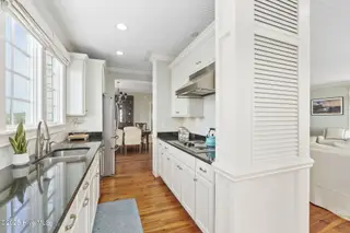 125 Roosevelt Drive, Pine Knoll Shores, NC 28512 — 5-bedroom home in Roosevelt Beach, Pine Knoll Shores, NC, photo 17 of 61: Modern kitchen w/ great views