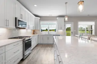 212 Taylorwood Drive, Beaufort, NC 28516 – photo 16: Modern kitchen w/ massive island