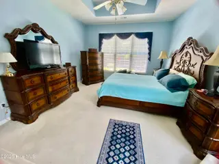7599 Dunbar Drive SW, Sunset Beach, NC 28468 – photo 20: Primary Bedroom
