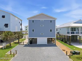 5205 E Pelican Drive, Oak Island, NC 28465 – photo 2: 1-web-or-mls-DJI_20260529133722_0153_D