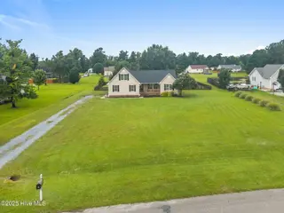 313 Oakmont Drive, Hampstead, NC 28443 – photo 4: 4-web-or-mls-DJI_20250811101047_0190_D