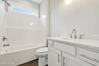 305 Birmingham Avenue 2, Carolina Beach, NC 28428 — 4-bedroom townhome, Carolina Beach, NC, photo 18 of 27: 215SpartanburgAvenueUnit1-19