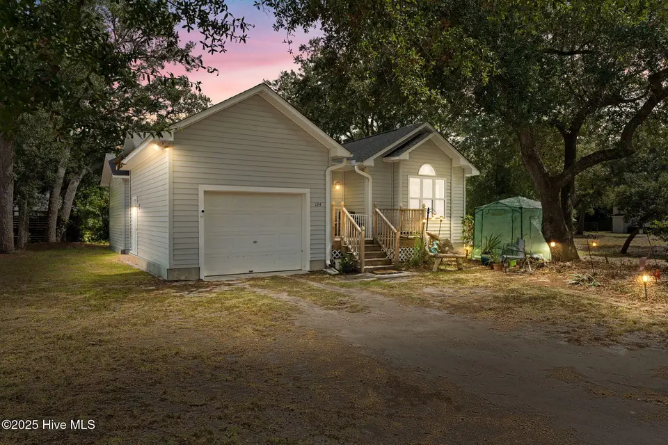 124 NW 8th Street, Oak Island, NC 28465 — 3-bedroom home in Pinners Point, Oak Island, NC, photo 1 of 47: shniderproductions.com-2
