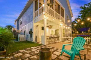 1225 Pinfish Lane, Carolina Beach, NC 28428 – photo 3: Back yard from media room