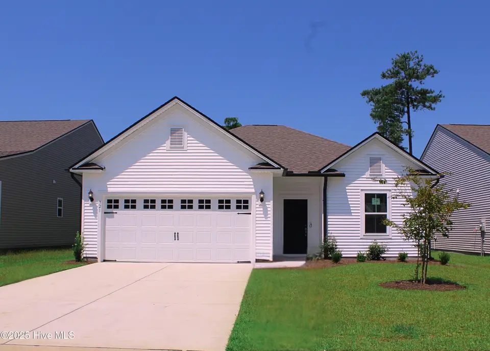 321 Eagle Claw Drive 4034, Carolina Shores, NC 28467 – photo 1 of 24: best front