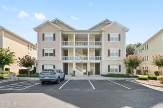 180 Clubhouse Road Apt 2, Sunset Beach, NC 28468 – photo 1: Front