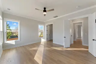 115 S Middleton Drive NW, Calabash, NC 28467 – photo 14: Primary Suite
