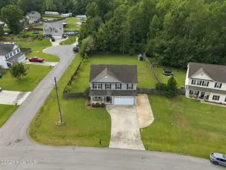 105 Lewis Humphrey Lane, Hubert, NC 28539 — 4-bedroom home in Waters Edge, Hubert, NC, photo 3 of 48: 9-web-or-mls-DJI_20260925125028_0053_D
