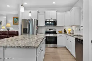 1109 Coral Reef Drive, New Bern, NC 28560 – photo 10: Brown - kitchen side view