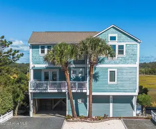 648 Ocean Boulevard W, Holden Beach, NC 28462 — 3-bedroom home in Bacon Island Harbor, Holden Beach, NC, photo 1 of 65: Front 1