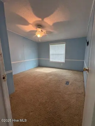 1554 Gate 2 SW, Ocean Isle Beach, NC 28469 — 3-bedroom manufactured home in Seaside North, Ocean Isle Beach, NC, photo 12 of 17: IMG_2402