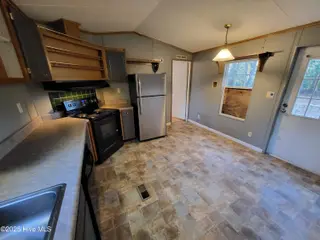 119 Edgewater Lane, Richlands, NC 28574 — 2-bedroom manufactured home in Chapel Ridge, Richlands, NC, photo 18 of 34: Kitchen/Dining
