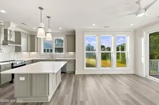 52 Pier View Court, Hampstead, NC 28443 — 3-bedroom waterfront home, Hampstead, NC, photo 4 of 60: 31_kitchen & living area
