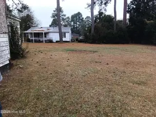 112 N Secrest Street, Kinston, NC 28501 – photo 13: backyard and extra lot