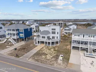 6618 W Beach Drive, Oak Island, NC 28465 – photo 12: 7-web-or-mls-DJI_20260304121339_0409_D