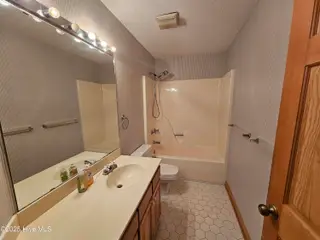 3235 Marsh View Drive SW, Supply, NC 28462 — 3-bedroom home in Lockwood Folly, Supply, NC, photo 16 of 36: Spare Bath