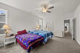 2031 Folkstone Woods Lane, Holly Ridge, NC 28445 – photo 21: Master Bedroom