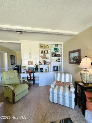 2128 Rivershore Road, Elizabeth City, NC 27909 — 3-bedroom home in Winslow Acres, Elizabeth City, NC, photo 13 of 48: Built in bookcase